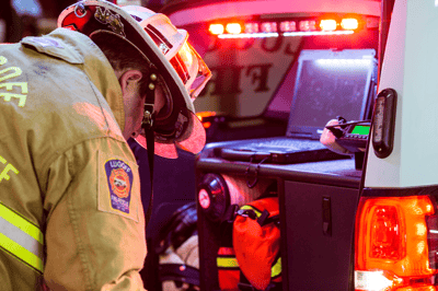 First responder using FirstNet-compatible device in the field